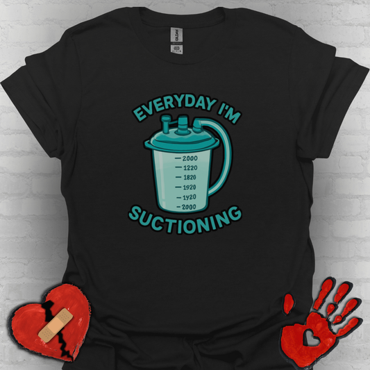 Everyday I’m Suctioning – Tracheostomy Warrior Humor Tee (Teal)
